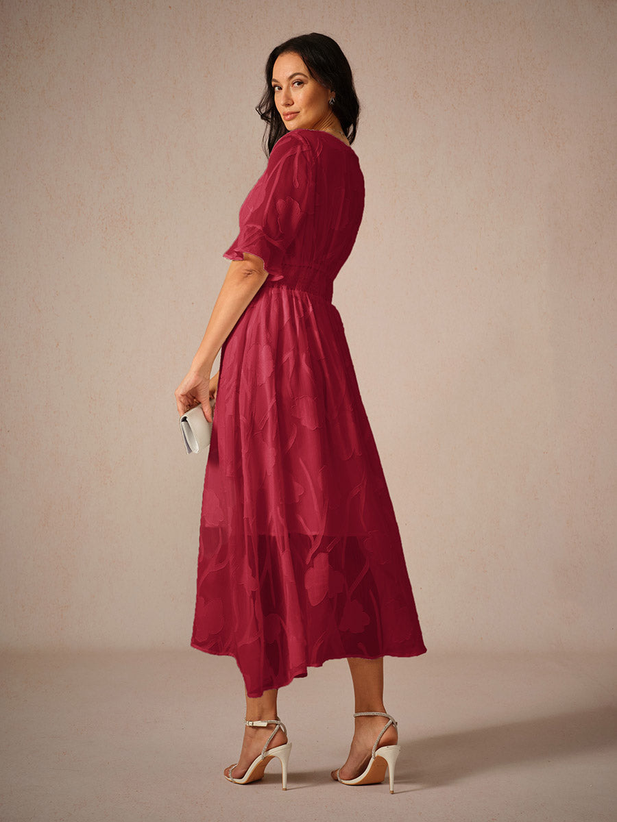 Damklänning maxi – spetsblommig – V-ringning – holkärm – elegant passform