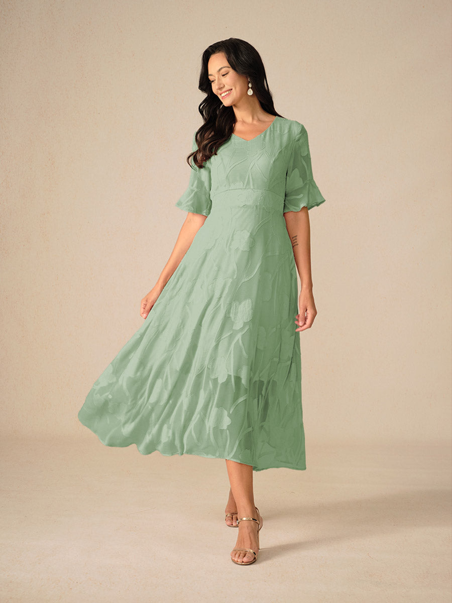 Damklänning maxi – spetsblommig – V-ringning – holkärm – elegant passform