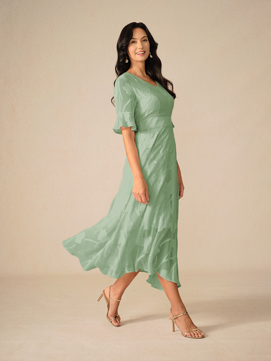 Damklänning maxi – spetsblommig – V-ringning – holkärm – elegant passform