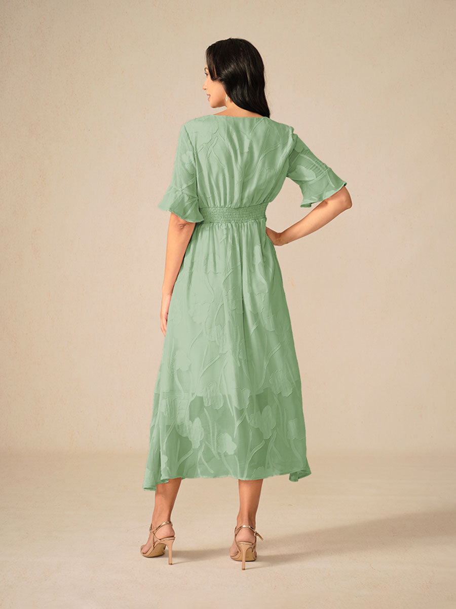 Damklänning maxi – spetsblommig – V-ringning – holkärm – elegant passform