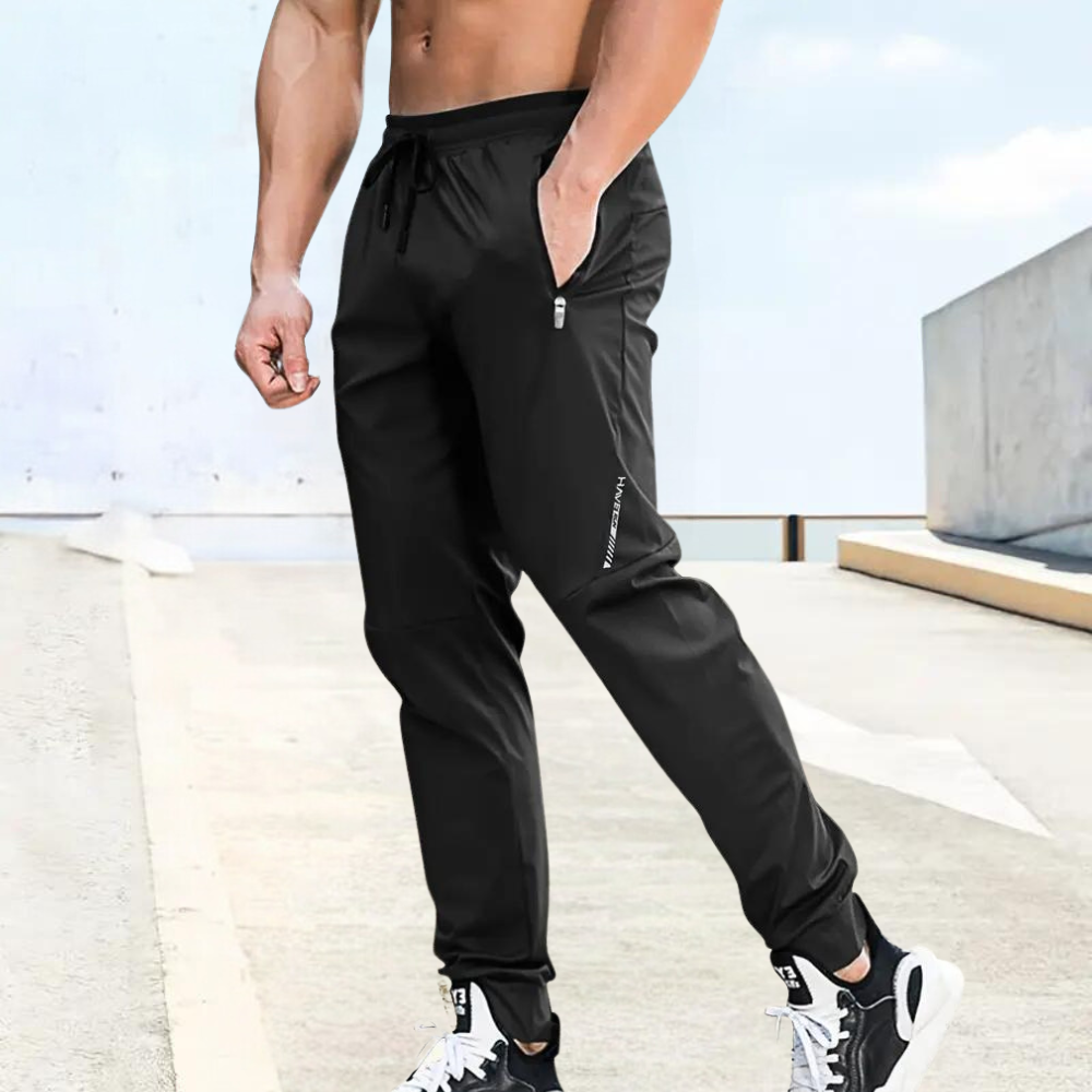 Herr Joggingbyxor - Sportig Passform - Elastisk Midja med Dragsko - Fickor med Dragkedja
