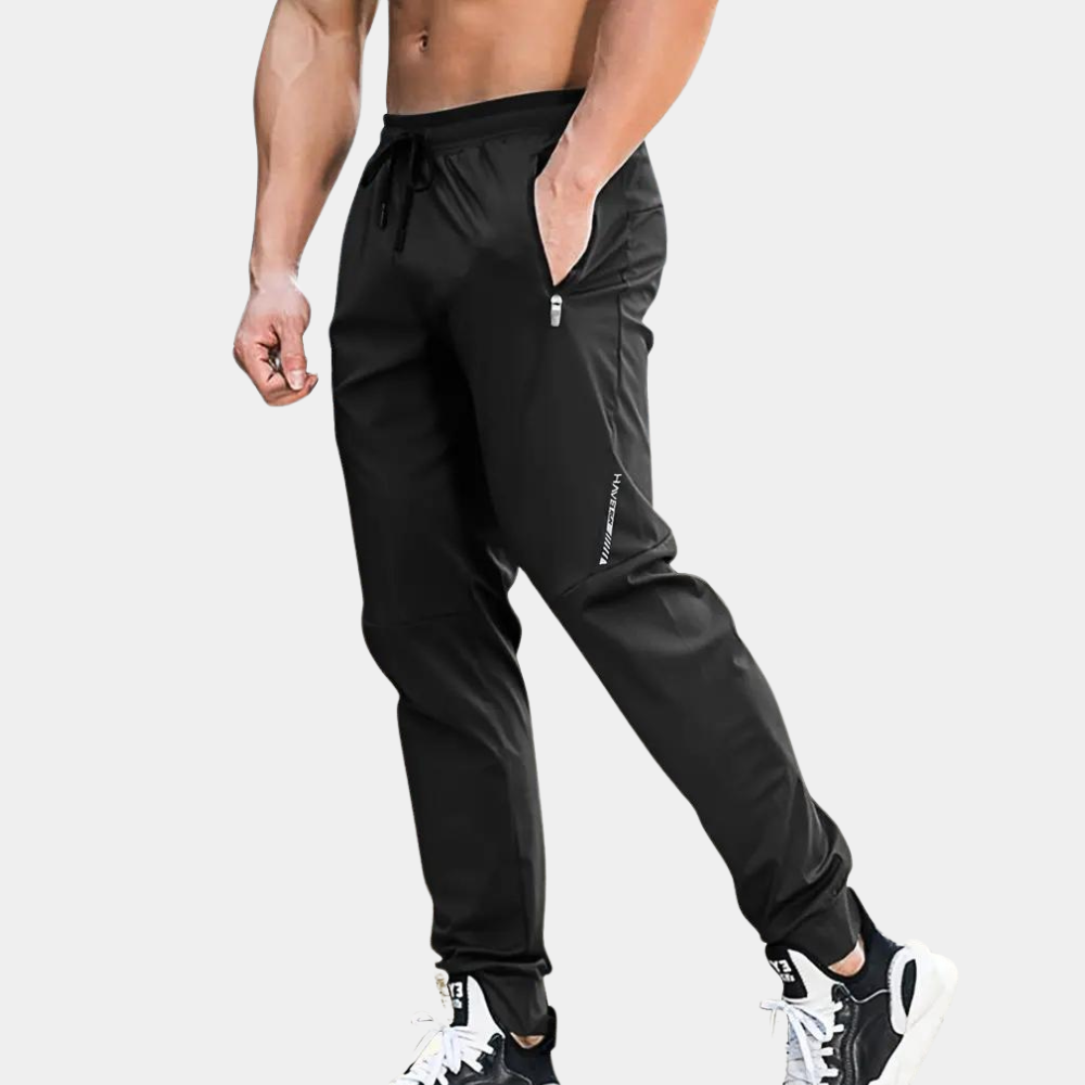 Herr Joggingbyxor - Sportig Passform - Elastisk Midja med Dragsko - Fickor med Dragkedja