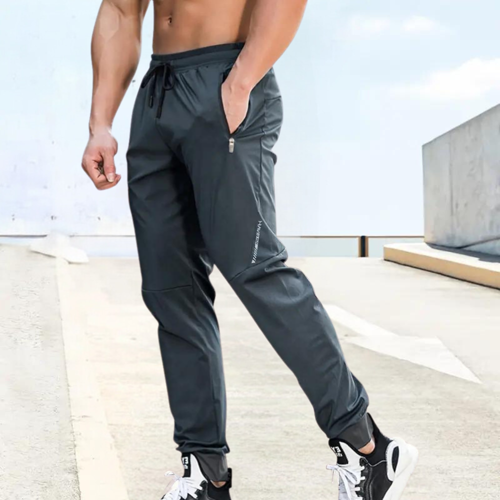 Herr Joggingbyxor - Sportig Passform - Elastisk Midja med Dragsko - Fickor med Dragkedja