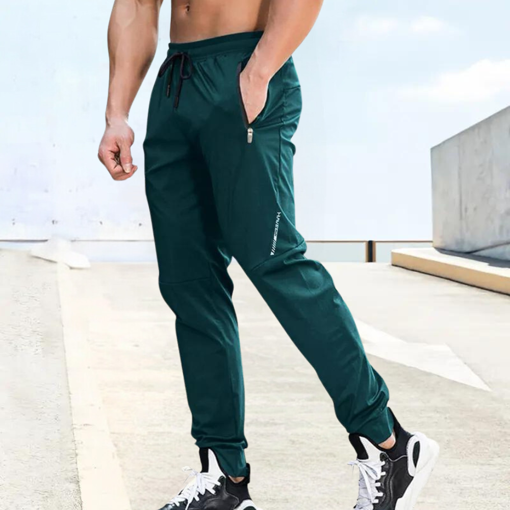 Herr Joggingbyxor - Sportig Passform - Elastisk Midja med Dragsko - Fickor med Dragkedja