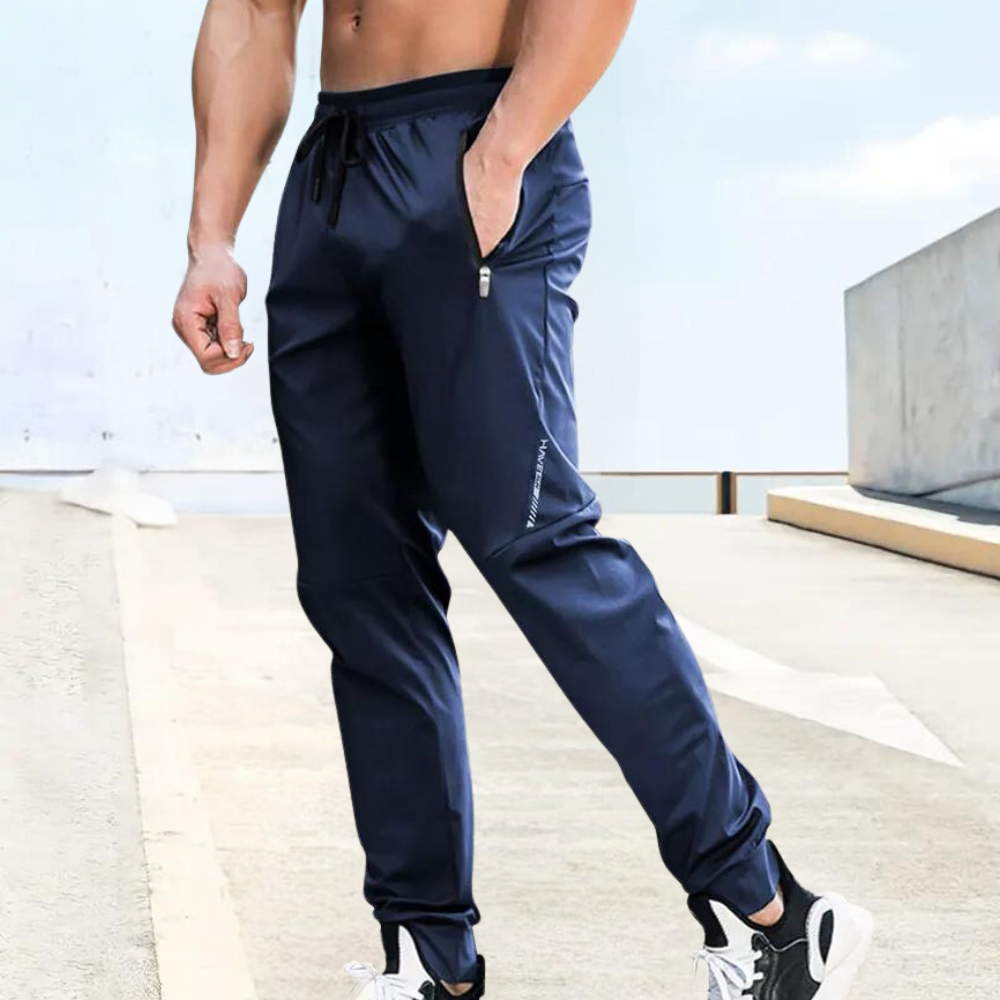 Herr Joggingbyxor - Sportig Passform - Elastisk Midja med Dragsko - Fickor med Dragkedja