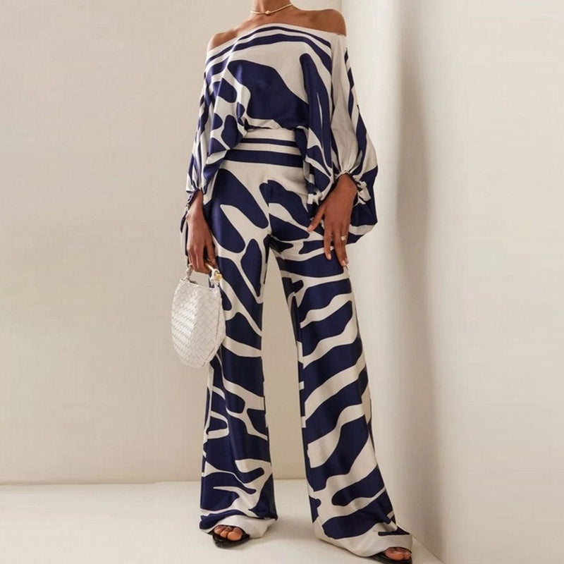 Set med blus och byxor för kvinnor - Relaxed Fit - Blus med en axel - Byxor med vida ben