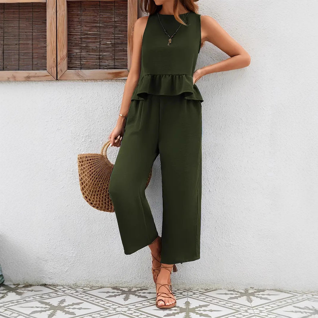 Damset – ärmlös väst – rynkad midja – vida ben – naturliga fibrer