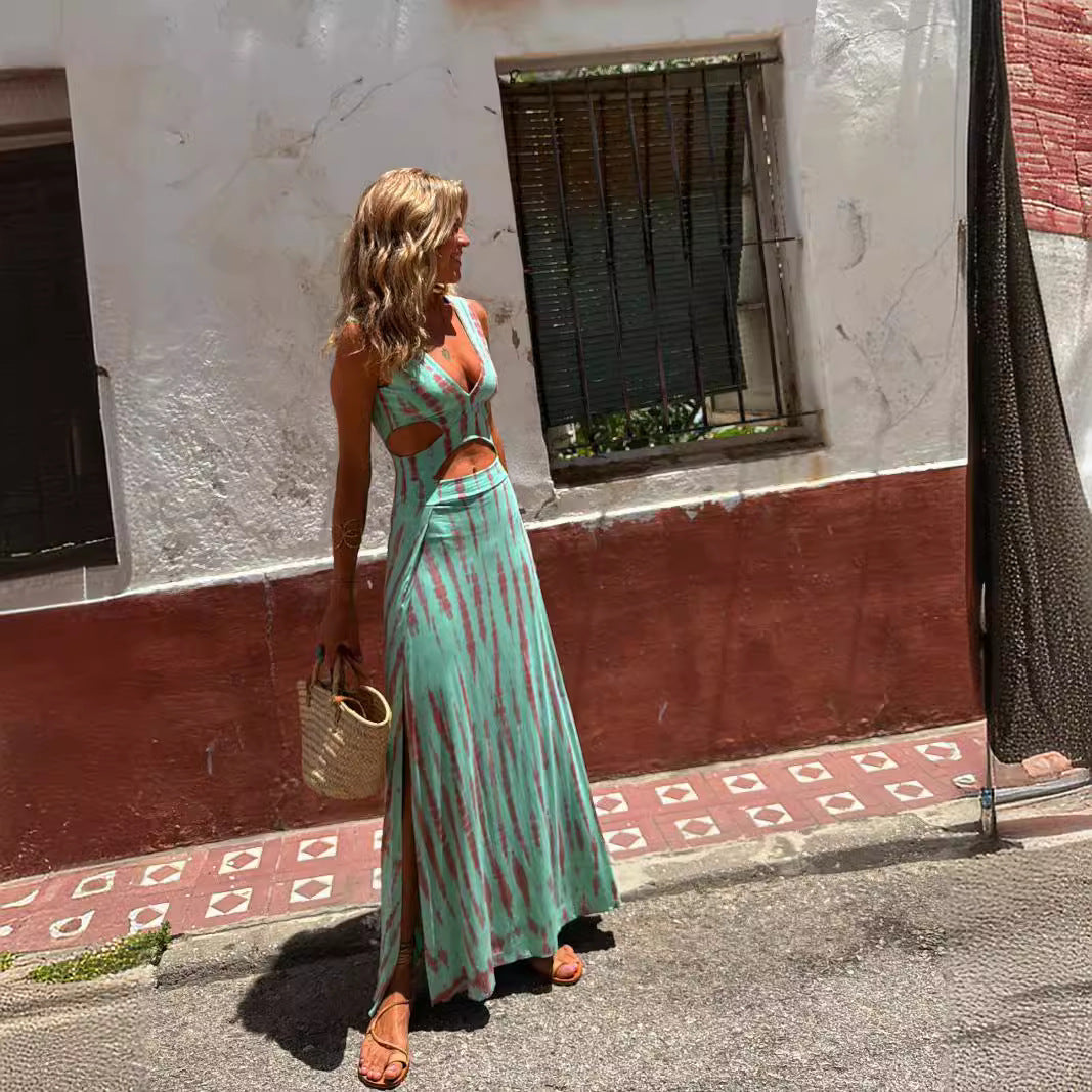 Damklänning maxi – Slim fit – V-ringning – Midjecutouts – Lättviktsmaterial – Mönstrad
