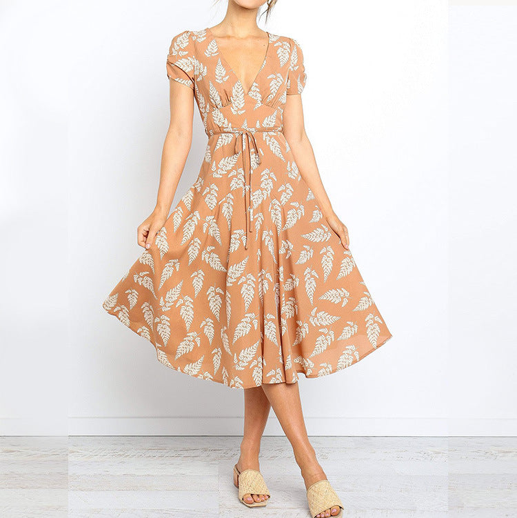 Damklänning midi – Justerbar midja – V-ringning – Kort ärm