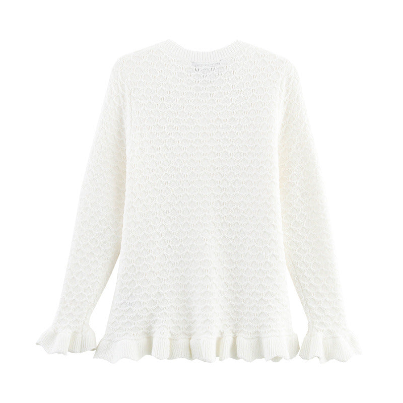 Damtröja med rund hals – Knappar framtill – Volangkant – Hålstickning – Långärmad