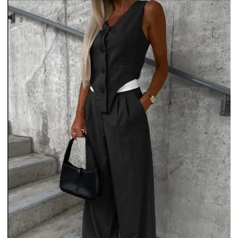 Elegant damkostym - Ärmlös väst - Vida byxor - Knäppningsmodell