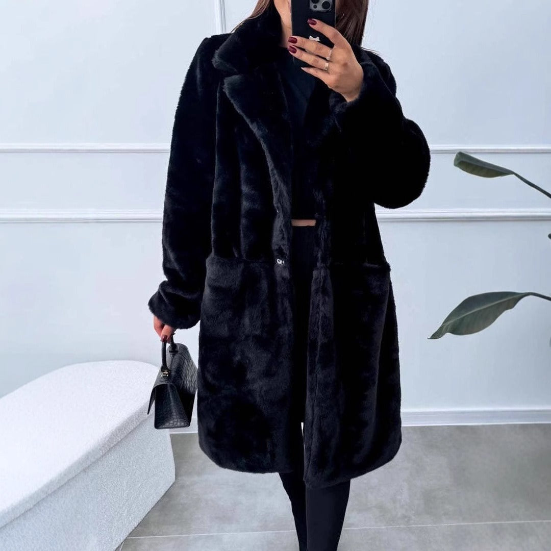 Dam lång kappa – Oversized passform – Mjuk textur – Vida slag – Framfickor