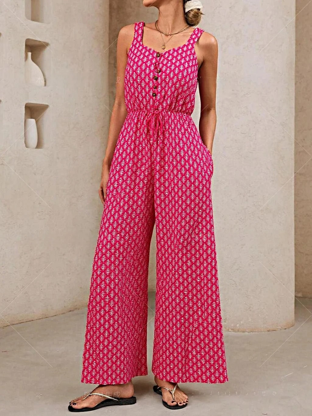 Damjumpsuit – Avslappnad Passform – V-ringning – Ärmlös – Dragskomidja – Vida Ben