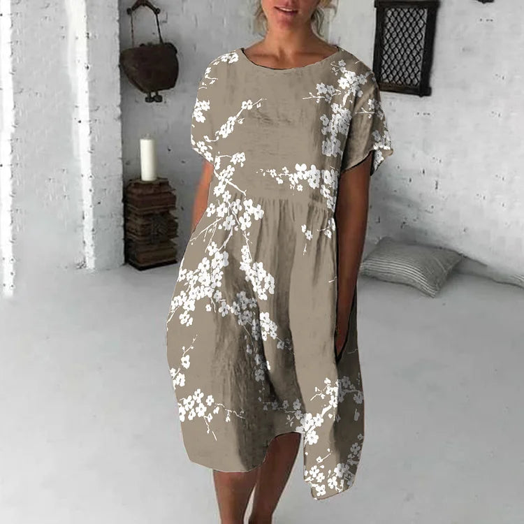 Damklänning midi – avslappnad passform – kort ärm – blommigt tryck – andningsbart tyg