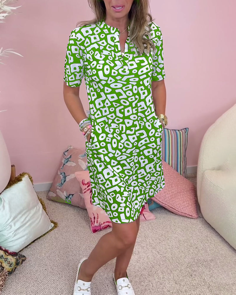 Damklänning – Avslappnad passform – V-ringning – Kort ärm – Naturfibrer – Med fickor