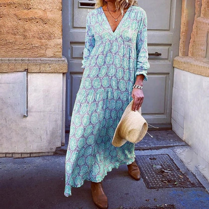 Damklänning maxi – avslappnad passform – långärmad – V-ringning – geometriskt mönster