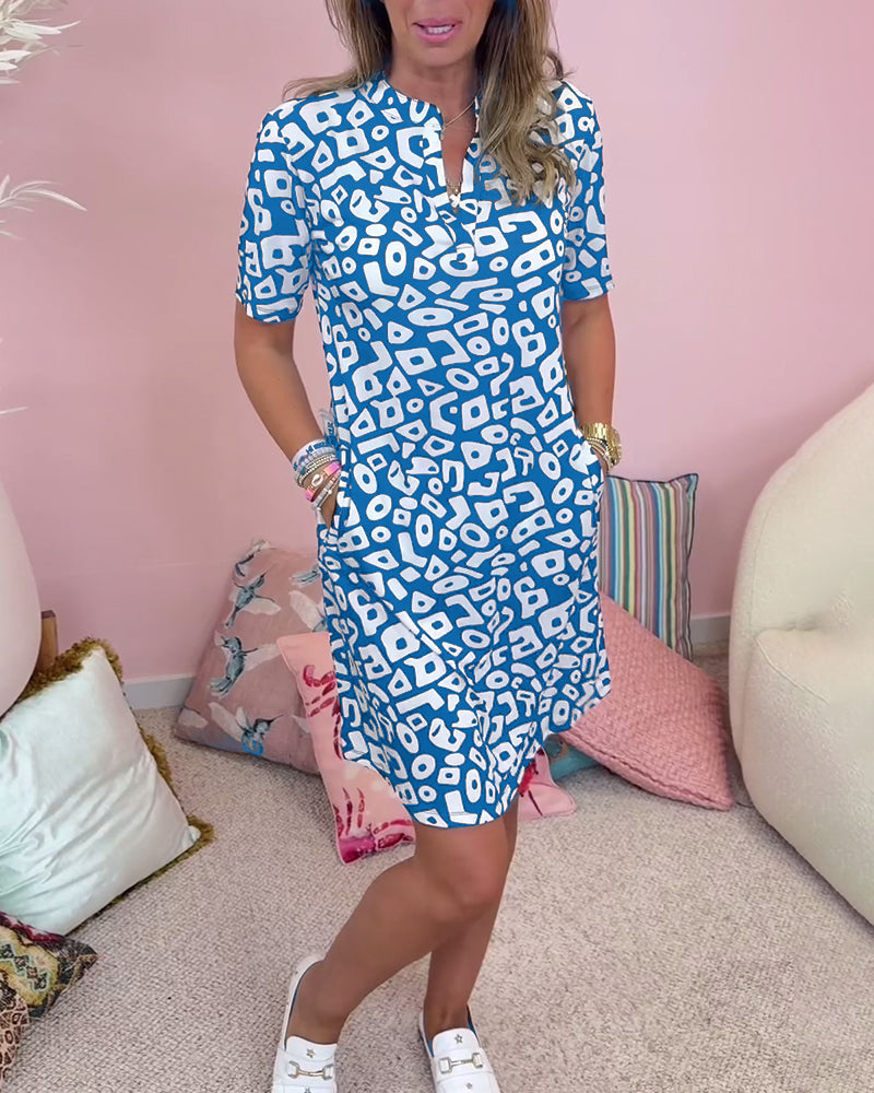 Damklänning – Avslappnad passform – V-ringning – Kort ärm – Naturfibrer – Med fickor