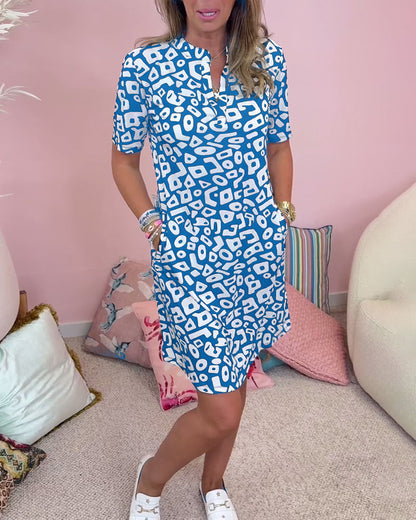 Damklänning – Avslappnad passform – V-ringning – Kort ärm – Naturfibrer – Med fickor