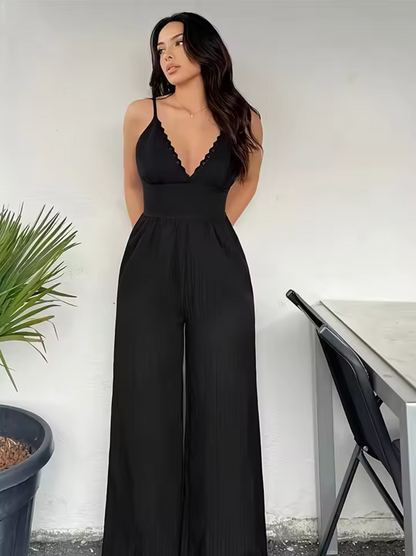 Dam Jumpsuit - Ärmös Med Spagettiband - V-Ringning Med Volang - Vida Ben - Figursydd