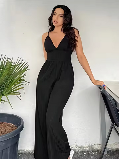 Dam Jumpsuit - Ärmös Med Spagettiband - V-Ringning Med Volang - Vida Ben - Figursydd