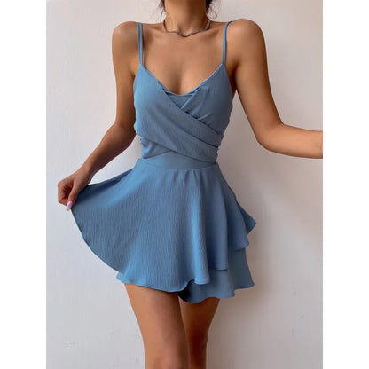 Damklänning i omlottmodell - Spaghettiband - Böljande A-linjeformad design