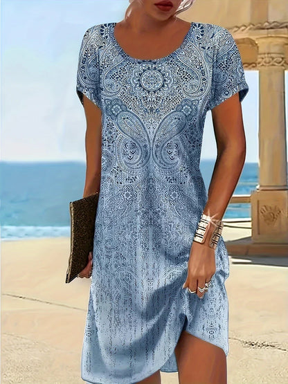 Damklänning midi – Avslappnad passform – Andningsbart tyg – Kort ärm – Mönstrad design