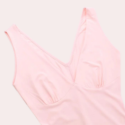 Damtoppklänning – V-ringad – Ärmlös – Asymmetrisk Volangkant – Elegant och Stilren