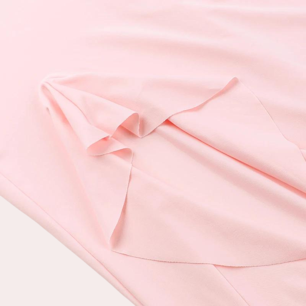 Damtoppklänning – V-ringad – Ärmlös – Asymmetrisk Volangkant – Elegant och Stilren