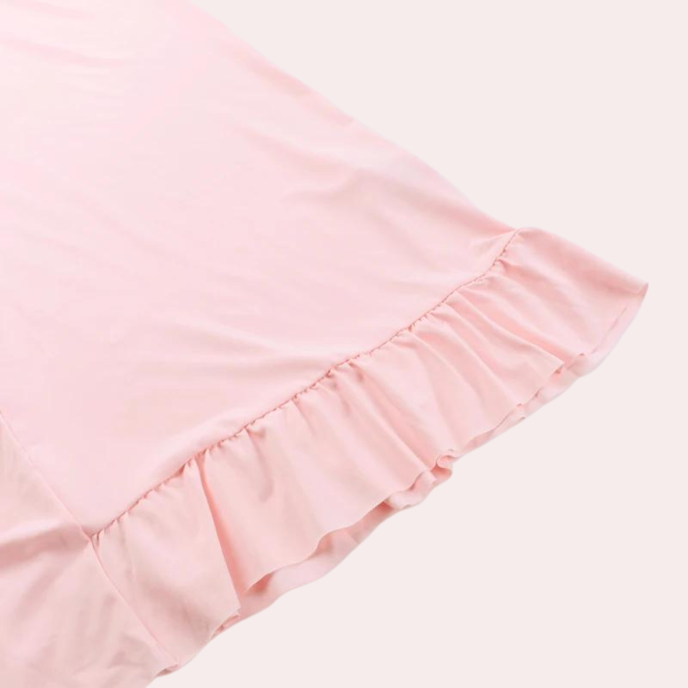 Damtoppklänning – V-ringad – Ärmlös – Asymmetrisk Volangkant – Elegant och Stilren