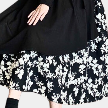 Damklänning – Lager-på-lager design – Asymmetrisk fåll – Blommigt foder – Lång ärm