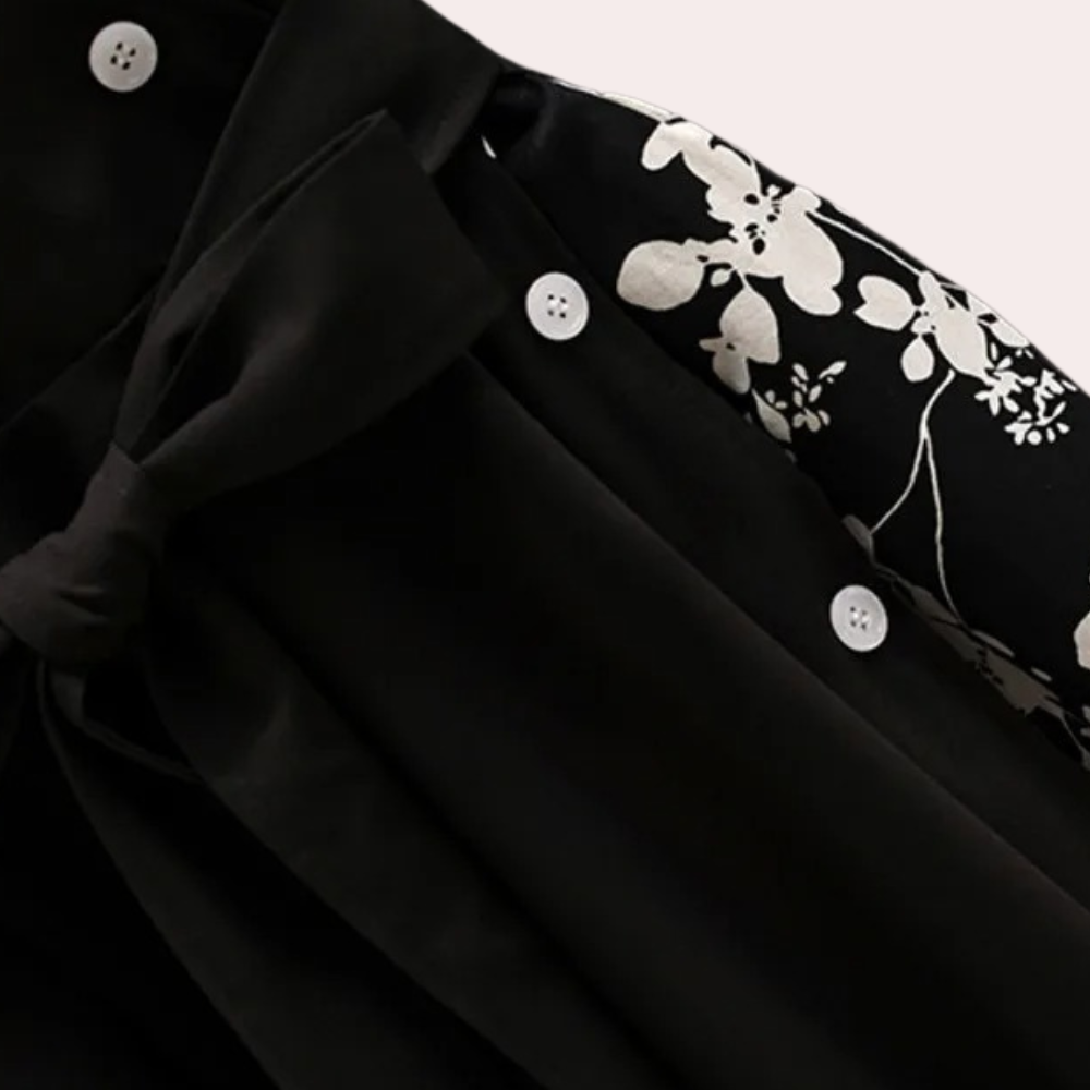 Damklänning – Lager-på-lager design – Asymmetrisk fåll – Blommigt foder – Lång ärm