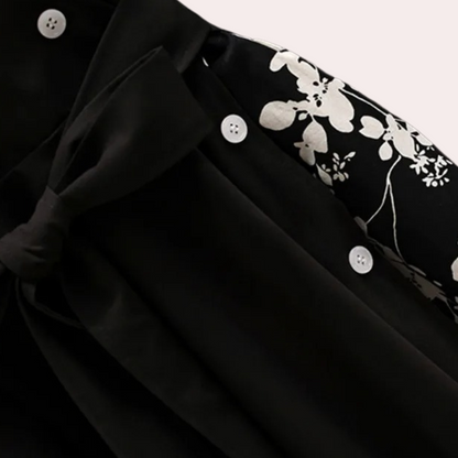 Damklänning – Lager-på-lager design – Asymmetrisk fåll – Blommigt foder – Lång ärm