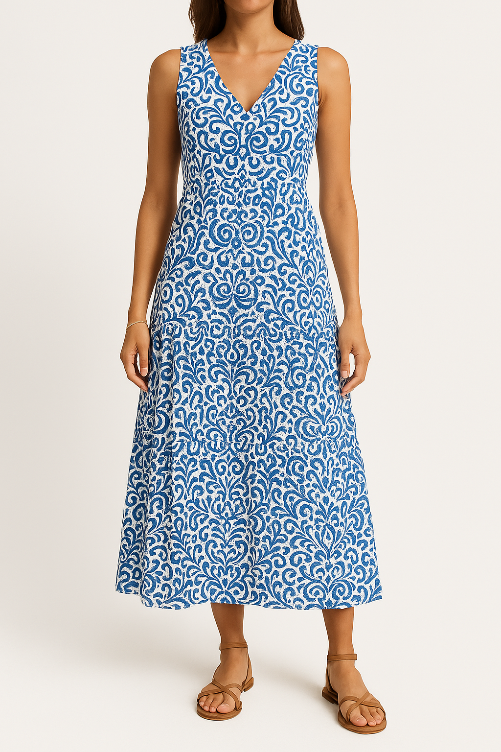 Damklänning midi – ärmlös V-ringning – avslappnad passform – abstrakt mönster – A-linjeformad