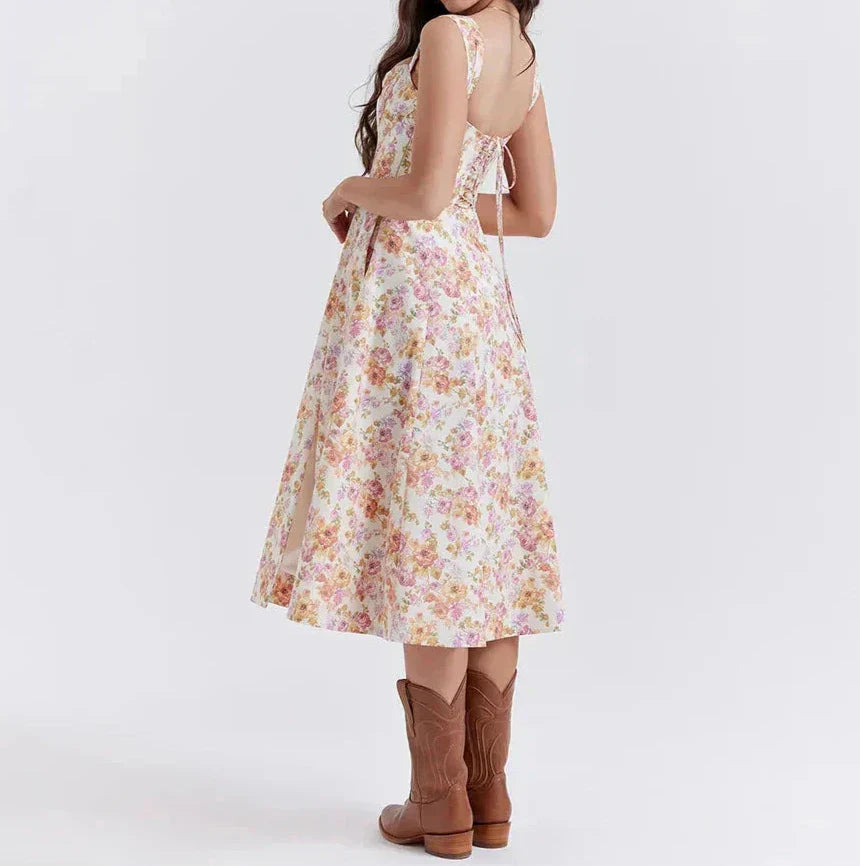 Damklänning midi – Korsettliv – A-linjeform – Breda axelband – Blommigt mönster – Slits