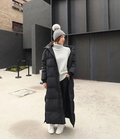 Lång vadderad damkappa – Oversized passform – Hög krage – Quiltad design – Varm och lätt