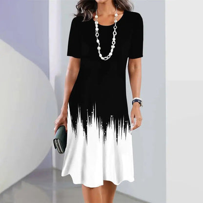 Damtunika Klänning – Knälång A-linje – Kortärmad Rund Hals – Elegant Mönstrad