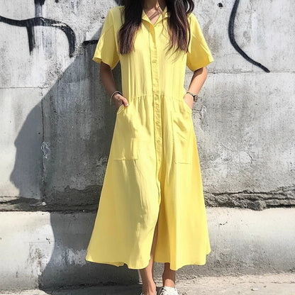 Damklänning skjortmodell – Avslappnad passform – Knäppning framtill – Andningsbar blandning – Midilängd