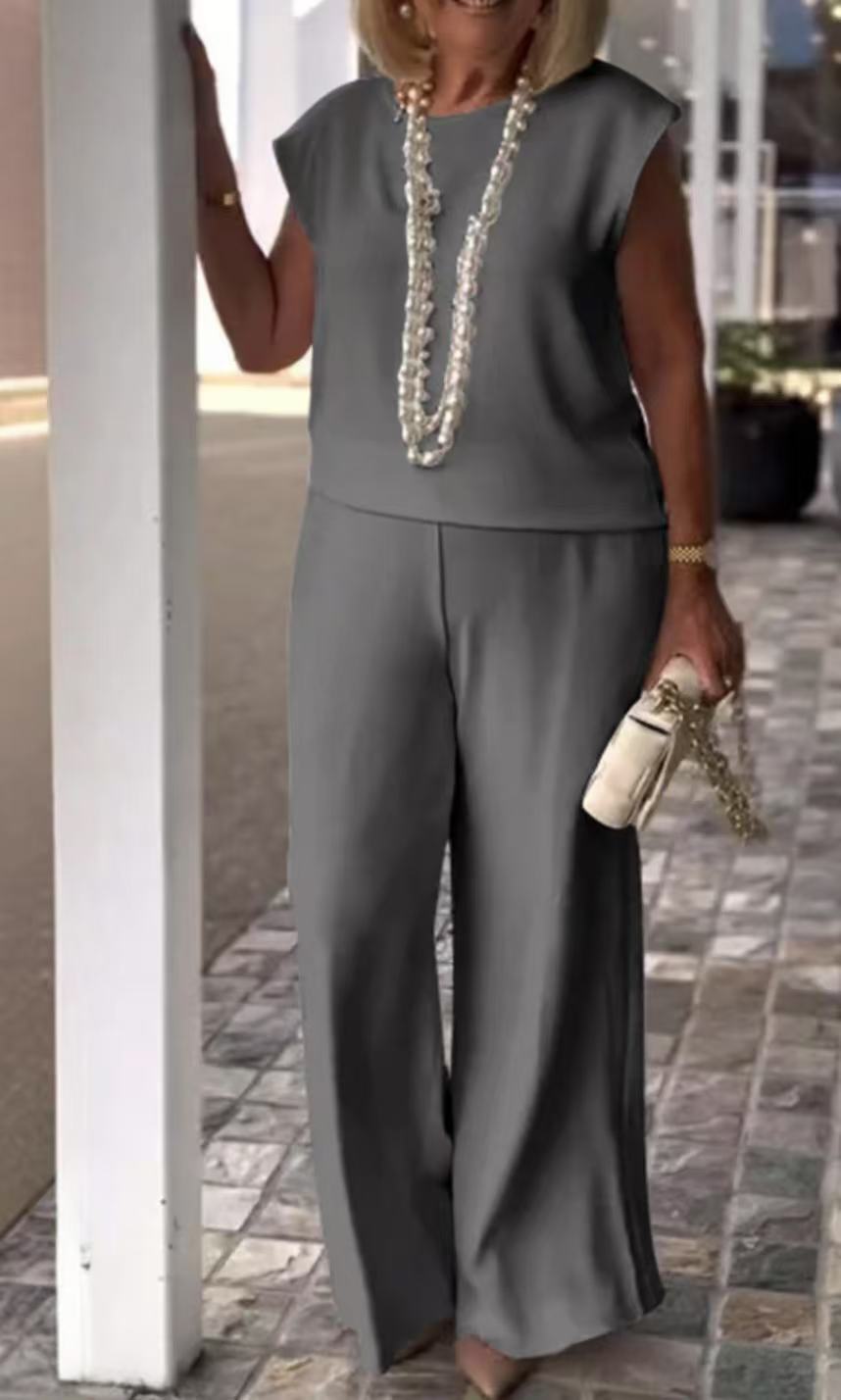Damklädset – Ärmös Topp – Vida Byxor – Elegant Avslappnad Passform