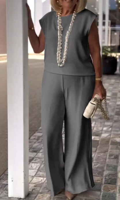 Damklädset – Ärmös Topp – Vida Byxor – Elegant Avslappnad Passform
