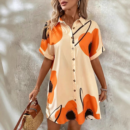 Damklänning shift – Blommigt mönster – Knäppning fram – Uppvikta kortärmar – Ledig passform