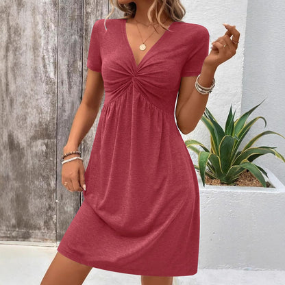 Damklänning – Mjukstickad – V-ringning – Twistfront – Kort ärm – Avslappnad passform