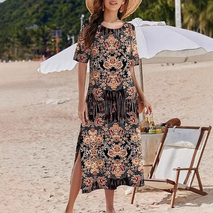 Damklänning maxi – avslappnad passform – blommigt tryck – luftigt material – slitsar