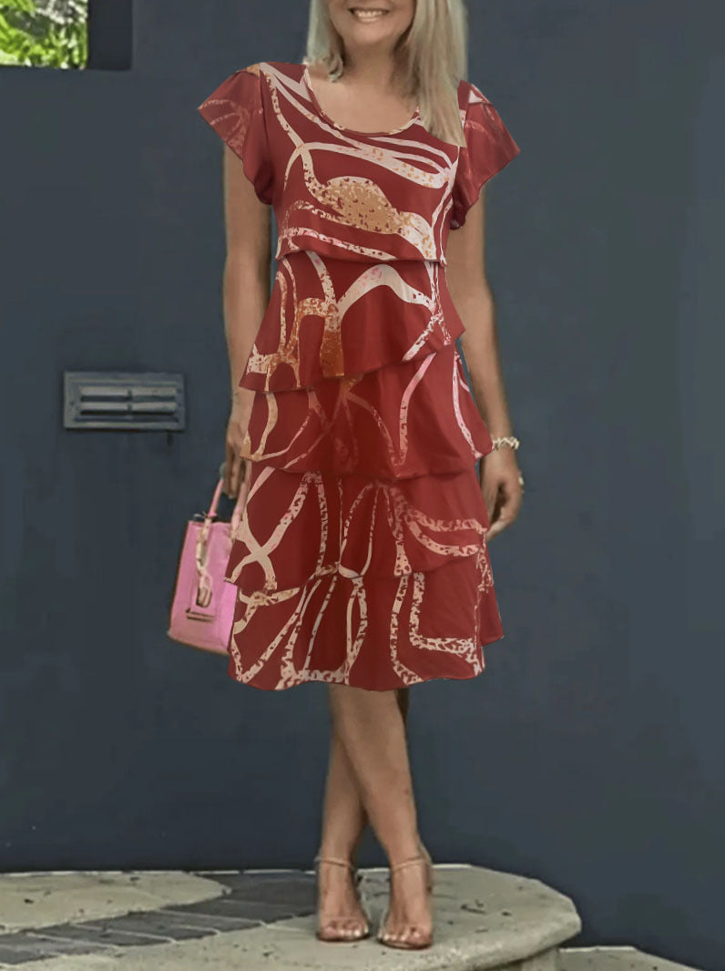 Damklänning midi – avslappnad passform – lotusärm – volangkjol – tryckt mönster