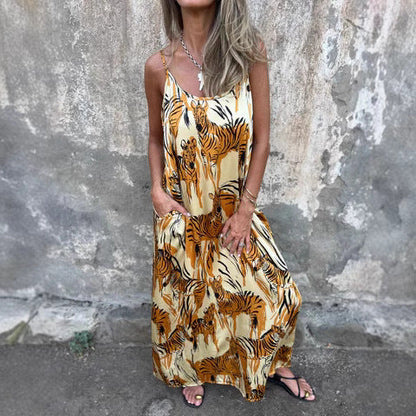 Damklänning maxi – Avslappnad passform – Justerbara axelband – Naturmaterial – Fickor