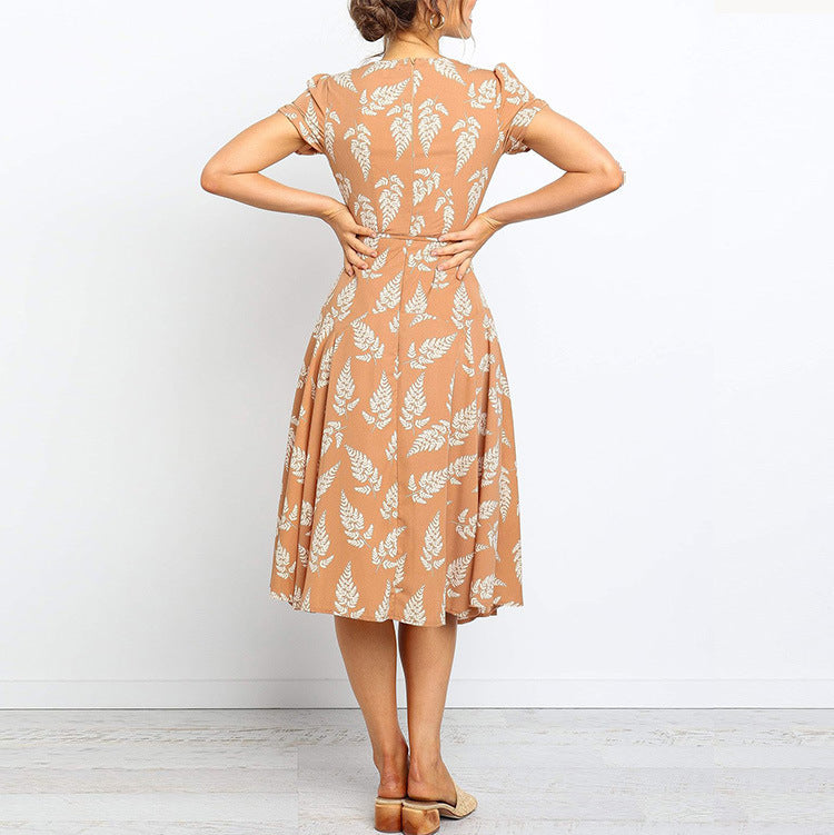 Damklänning midi – Justerbar midja – V-ringning – Kort ärm