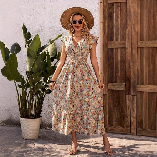 Damklänning maxi – V-ringning – Blommig – Kort volangärm – Skiktad kjol – Bomull