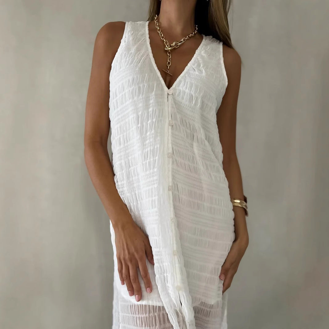 Damklänning lång – spetsmönster – ärmlös – V-ringning – slits framtill – luftig passform