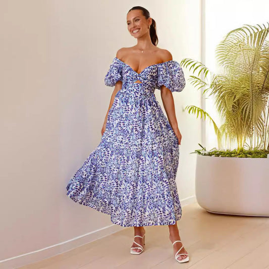 Dammaxiklänning - off-shoulder - puffärmar - smockad midja - luftig - tryckt