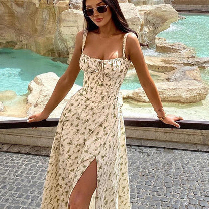 Damklänning midi – Ärmös – Figurnära liv – Knytning fram – Blommigt mönster