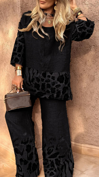 Damset – Avslappnad passform – Linnekänsla – Vida byxor – Djurmönstrade detaljer